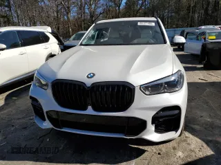 2022 BMW X5 sDrive40i with VIN 5UXCR4C01N9J97204, listed as a Copart auction lot 88157405 with 34,788 mi miles and Salvage Title. Bid and sale history available at carsss.com. Image 5.