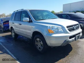 2004 Honda Pilot EX with VIN 2HKYF18594H519175, listed as a IAAI auction lot 41899345 with 268,718 mi miles. Bid and sale history available at carsss.com. Image 1.