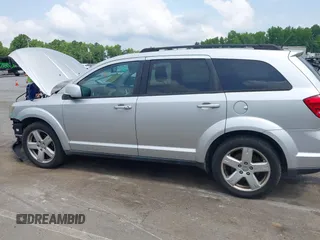 2012 Dodge Journey SXT z VIN 3C4PDCBGXCT324756, wystawiony jako IAAI lot #42422533 z przebiegiem 241 934 mil mil oraz . Historia ofert i sprzedaży dostępna na DreamBid. Obrazek 14.
