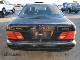 1999 Mercedes-Benz E-Class with VIN WDBJF82H9XX026911, listed as a Copart auction lot 48808835 with 205,953 mi miles and Salvage Title. Bid and sale history available at carsss.com. Image 6.