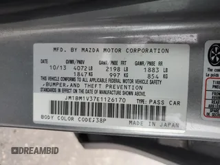 2014 Mazda 3 S Touring with VIN JM1BM1V37E1126170, listed as a Copart auction lot 43873865 with 125,525 mi miles and Salvage Title. Bid and sale history available at DreamBid. Image 14.