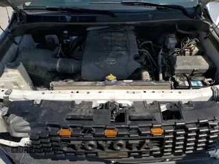 2015 Toyota Tundra SR z VIN 5TFRM5F13FX093914, wystawiony jako Copart lot #58087635 z przebiegiem 128 685 mil mil oraz Szkoda całkowita • Salvage title. Historia ofert i sprzedaży dostępna na DreamBid. Obrazek 11.
