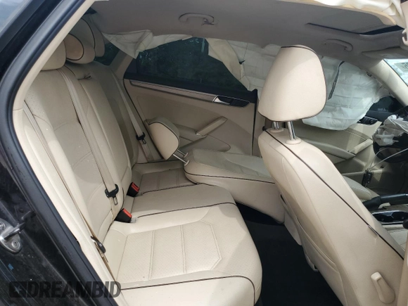 2017 Volkswagen Passat SE z VIN 1VWBT7A39HC030560, wystawiony jako Copart lot #55443585 z przebiegiem 125 397 mil mil oraz Szkoda całkowita • Salvage title. Historia ofert i sprzedaży dostępna na DreamBid. Obrazek 10.