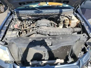 2005 Ford F-150 XLT with VIN 1FTPX145X5NA55054, listed as a Copart auction lot 56250845 with 260,876 mi miles and Salvage title. Bid and sale history available at DreamBid. Image 11.