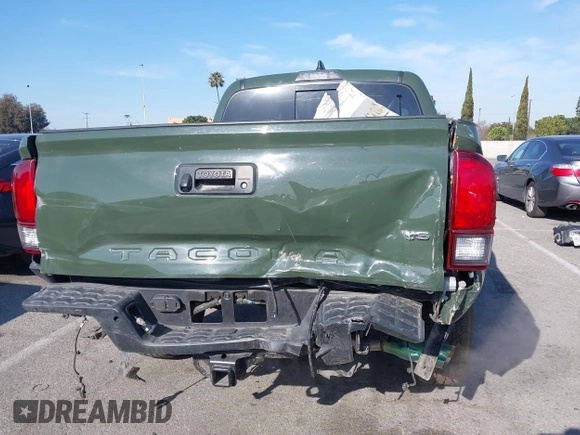 2021 Toyota Tacoma SR z VIN 3TMCZ5AN7MM395940, wystawiony jako IAAI lot #41860127 z przebiegiem 39 338 mil mil oraz . Historia ofert i sprzedaży dostępna na DreamBid. Obrazek 16.