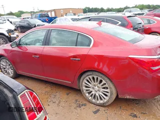 2014 Buick LaCrosse Premium II with VIN 1G4GF5G3XEF273604, listed as a IAAI auction lot 42252108 with 154,257 mi miles and . Bid and sale history available at DreamBid. Image 14.