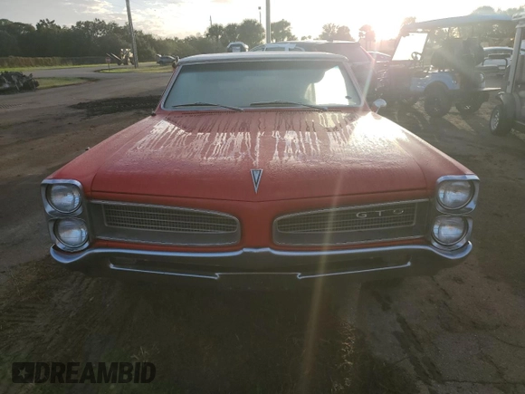 1966 Pontiac GTO z VIN 235676P261739, wystawiony jako Copart lot #75633424 z przebiegiem 23 103 mil mil oraz Szkoda całkowita • Salvage title. Historia ofert i sprzedaży dostępna na DreamBid. Obrazek 5.