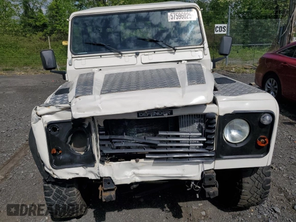 1996 Land Rover Defender с VIN SALLDHM68TA991998, выставлен на аукционе Copart как лот 57596025 с пробегом 150 656 миль миль и Списание • Salvage title. История ставок и продаж доступна на DreamBid. Изображение 5.