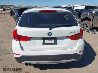 2015 BMW X1 sDrive28i with VIN WBAVM1C51FVZ94433, listed as a IAAI auction lot 41425205 with 148,346 mi miles. Bid and sale history available at carsss.com. Image 16.