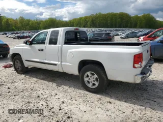 2005 Dodge Dakota SLT z VIN 1D7HW42K85S199470, wystawiony jako Copart lot #56304125 z przebiegiem 166 722 mil mil oraz Tytuł czysty. Historia ofert i sprzedaży dostępna na DreamBid. Obrazek 2.