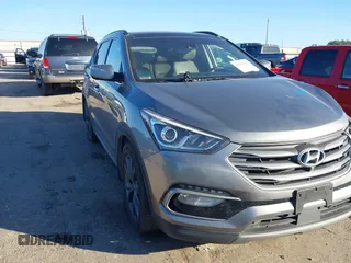 2018 Hyundai Santa Fe Ultimate z VIN 5XYZW4LA4JG513927, wystawiony jako IAAI lot #41214113 z przebiegiem 165 879 mil mil oraz . Historia ofert i sprzedaży dostępna na DreamBid. Obrazek 1.