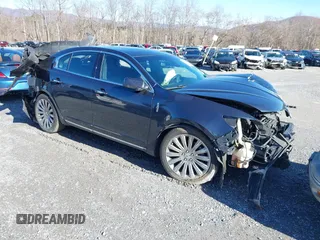 2013 Lincoln MKS z VIN 1LNHL9DK9DG609722, wystawiony jako IAAI lot #41514279 z przebiegiem 165 277 mil mil oraz . Historia ofert i sprzedaży dostępna na DreamBid. Obrazek 1.