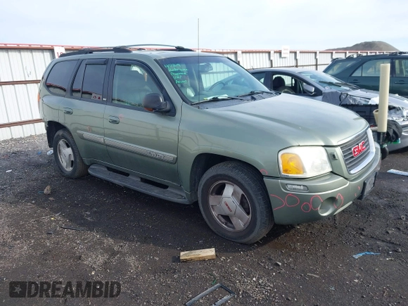 2003 GMC Envoy SLT with VIN 1GKDT13SX32161898, listed as a IAAI auction lot 41642072 with 230,154 mi miles. Bid and sale history available at carsss.com. Image 1.