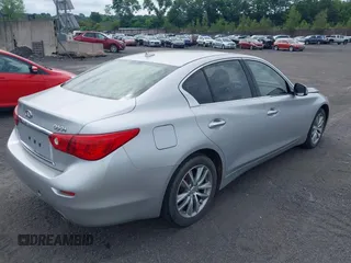 2015 Infiniti Q50 Sport with VIN JN1BV7AR1FM396590, listed as a IAAI auction lot 42687130 with 104,265 mi miles and . Bid and sale history available at DreamBid. Image 4.