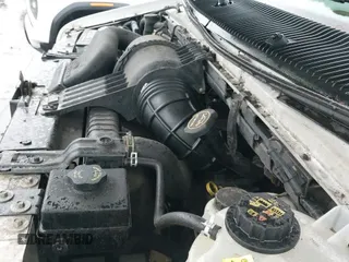 2003 Ford Econoline Cargo z VIN 1FTNE24273HA88016, wystawiony jako IAAI lot #41481068 z przebiegiem 154 767 mil mil oraz . Historia ofert i sprzedaży dostępna na DreamBid. Obrazek 12.