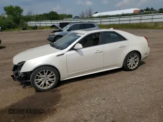 2011 Cadillac CTS Premium with VIN 1G6DS5ED6B0164881, listed as a Copart auction lot 64265665 with 100,525 mi miles and Salvage title. Bid and sale history available at DreamBid. Image 1.