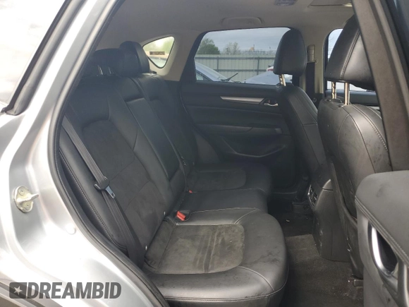 2020 Mazda CX-5 Touring z VIN JM3KFBCM2L0750223, wystawiony jako Copart lot #56300415 z przebiegiem 87 392 mil mil oraz Szkoda całkowita • Salvage title. Historia ofert i sprzedaży dostępna na DreamBid. Obrazek 11.