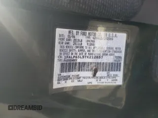 1996 Ford Contour z VIN 1FALP65L5TK212857, wystawiony jako Copart lot #76701614 z przebiegiem 74 994 mil mil oraz Szkody całkowita. Historia ofert i sprzedaży dostępna na DreamBid. Obrazek 12.