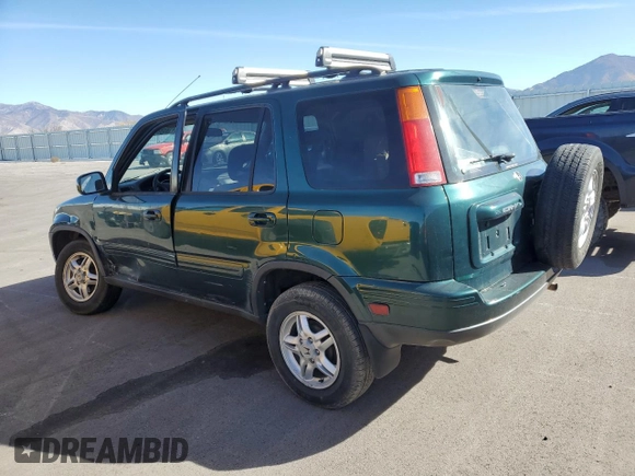 2001 Honda CR-V SE with VIN JHLRD18781C022253, listed as a Copart auction lot 77185924 with 190,434 mi miles and Salvage Title. Bid and sale history available at carsss.com. Image 2.