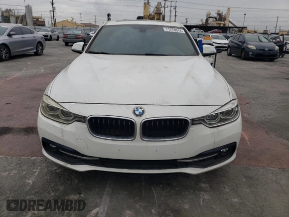 2018 BMW 3 Series 330i with VIN WBA8B9G57JNU57523, listed as a Copart auction lot 71773014 with 66,035 mi miles and Salvage Title. Bid and sale history available at carsss.com. Image 5.