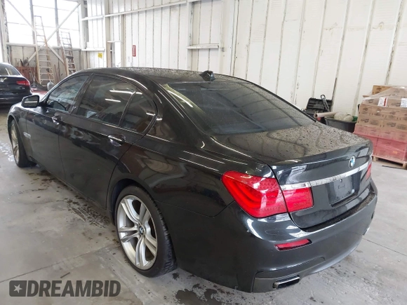 2011 BMW 7 Series 750Li xDrive with VIN WBAKC8C58BC432517, listed as a IAAI auction lot 41874352 with 125,288 mi miles and . Bid and sale history available at DreamBid. Image 3.