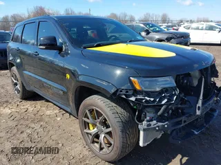 2020 Jeep Grand Cherokee Trackhawk with VIN 1C4RJFN90LC270573, listed as a IAAI auction lot 42023189 with Not provided miles and . Bid and sale history available at DreamBid. Image 1.