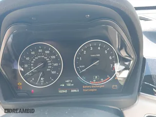 2017 BMW X1 xDrive28i with VIN WBXHT3C33H5F82035, listed as a IAAI auction lot 41944399 with 102,942 mi miles. Bid and sale history available at carsss.com. Image 7.