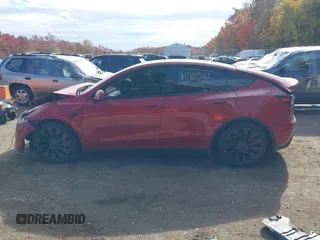 2023 Tesla Model Y Performance with VIN 7SAYGDEF6PF870935, listed as a IAAI auction lot 40718563 with 15,286 mi miles and . Bid and sale history available at DreamBid. Image 14.