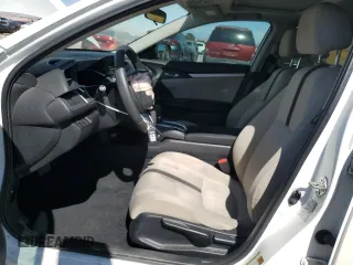 2016 Honda Civic EX-T z VIN 19XFC1F35GE029827, wystawiony jako Copart lot #55698325 z przebiegiem 108 297 mil mil oraz Szkoda całkowita • Salvage title. Historia ofert i sprzedaży dostępna na DreamBid. Obrazek 7.
