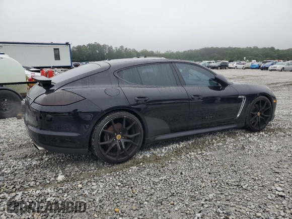 2011 Porsche Panamera с VIN WP0AA2A7XBL012084, выставлен на аукционе Copart как лот 58038975 с пробегом 65 399 миль миль и Списание • Salvage title. История ставок и продаж доступна на DreamBid. Изображение 3.