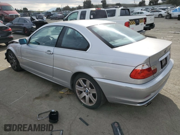 2003 BMW 3 Series 325Ci with VIN WBABN33453PG60668, listed as a Copart auction lot 42127385 with 155,189 mi miles and Salvage Title. Bid and sale history available at carsss.com. Image 2.
