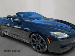 2014 BMW 6 Series z VIN WBAYP9C52ED16921, wystawiony jako Copart lot #55470855 z przebiegiem 101 777 mil mil oraz Czysty tytuł • Clean title. Historia ofert i sprzedaży dostępna na DreamBid. Obrazek 1.