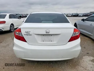 2012 Honda Civic LX z VIN 2HGFB2F50CH607469, wystawiony jako Copart lot #55878635 z przebiegiem 86 975 mil mil oraz Szkoda całkowita • Salvage title. Historia ofert i sprzedaży dostępna na DreamBid. Obrazek 6.