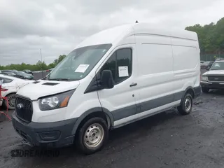 2021 Ford Transit Cargo with VIN 1FTBW1X84MKA98047, listed as a IAAI auction lot 42313747 with 65,600 mi miles and . Bid and sale history available at DreamBid. Image 17.