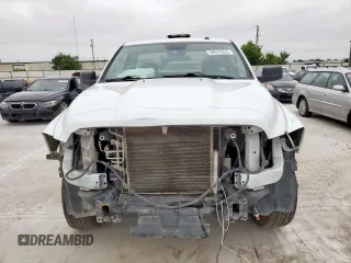 2023 Ram 1500 Tradesman with VIN 3C6JR6DG6PG671268, listed as a Copart auction lot 59573325 with 65,993 mi miles and Salvage title. Bid and sale history available at DreamBid. Image 5.