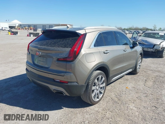 2020 Cadillac XT4 FWD Premium Luxury with VIN 1GYFZCR47LF052986, listed as a IAAI auction lot 41866449 with 56,422 mi miles and . Bid and sale history available at DreamBid. Image 4.