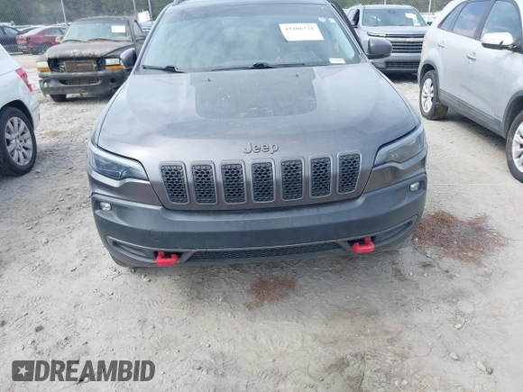 2019 Jeep Cherokee Trailhawk z VIN 1C4PJMBX1KD314121, wystawiony jako IAAI lot #42106721 z przebiegiem 105 631 mil mil oraz . Historia ofert i sprzedaży dostępna na DreamBid. Obrazek 12.
