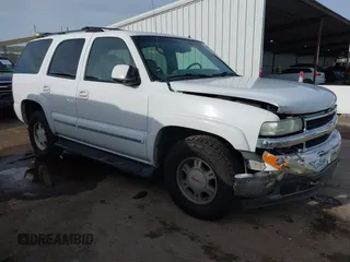 2002 Chevrolet Tahoe Z71 z VIN 1GNEK13Z42R256342, wystawiony jako IAAI lot #41838869 z przebiegiem 230 351 mil mil oraz . Historia ofert i sprzedaży dostępna na DreamBid. Obrazek 1.