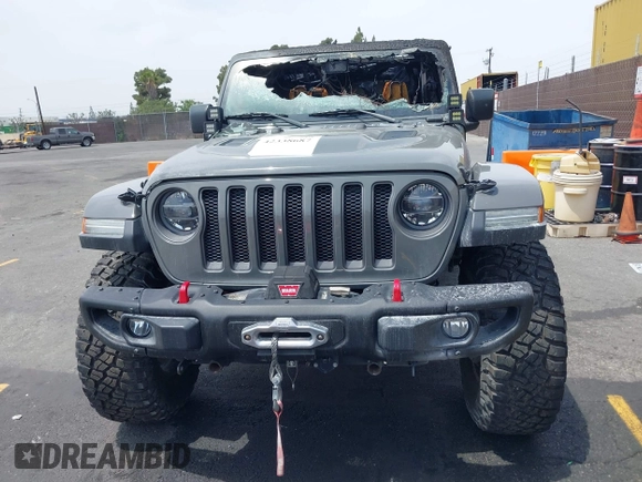 2020 Jeep Wrangler Unlimited Rubicon с VIN 1C4JJXFM4LW100382, выставлен на аукционе IAAI как лот 42338687 с пробегом Не указан миль и . История ставок и продаж доступна на DreamBid. Изображение 11.