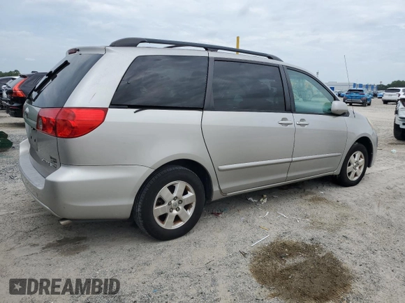 2012 Toyota Sienna XLE AAS with VIN 5TDYK3DC6CS275537, listed as a Copart auction lot 66040605 with 135,148 mi miles and Clean title. Bid and sale history available at DreamBid. Image 3.