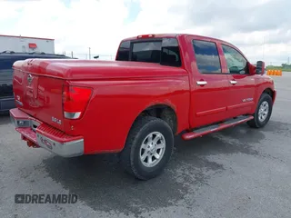2005 Nissan Titan SE with VIN 1N6BA07B35N500027, listed as a IAAI auction lot 42150226 with 200,877 mi miles. Bid and sale history available at carsss.com. Image 4.