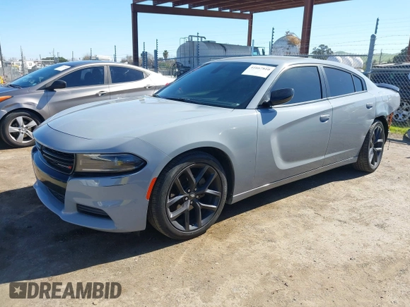 2022 Dodge Charger SXT with VIN 2C3CDXBG3NH231325, listed as a IAAI auction lot 41667810 with 74,967 mi miles and . Bid and sale history available at DreamBid. Image 18.