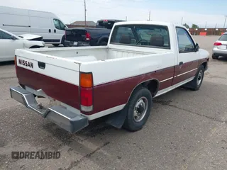 1991 Nissan Frontier XE with VIN 1N6SD11SXMC410552, listed as a IAAI auction lot 42439633 with 137,350 mi miles and . Bid and sale history available at DreamBid. Image 4.