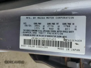 2005 Mazda 3 s with VIN JM1BK343951221655, listed as a Copart auction lot 54389825 with 95,052 mi miles and Salvage Title. Bid and sale history available at DreamBid. Image 12.
