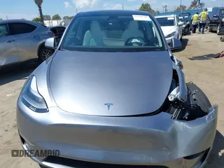 2024 Tesla Model Y Performance with VIN 7SAYGDEF9RA299036, listed as a IAAI auction lot 42140788 with 14,844 mi miles and . Bid and sale history available at DreamBid. Image 11.