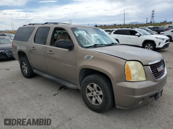 2007 GMC Yukon XL SLT z VIN 1GKFK163X7R327673, wystawiony jako Copart lot #52899415 z przebiegiem 147 180 mil mil oraz Szkoda całkowita • Salvage title. Historia ofert i sprzedaży dostępna na DreamBid. Obrazek 4.