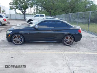 2014 BMW 2 Series M235i with VIN WBA1J7C50EVW84072, listed as a IAAI auction lot 41917841 with 102,745 mi miles and . Bid and sale history available at carsss.com. Image 14.
