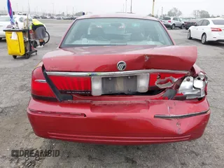 2000 Mercury Grand Marquis LS z VIN 2MEFM75W0YX658319, wystawiony jako IAAI lot #42028736 z przebiegiem 154 651 mil mil oraz . Historia ofert i sprzedaży dostępna na DreamBid. Obrazek 6.