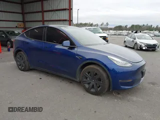 2021 Tesla Model Y Long Range with VIN 5YJYGDEE9MF071120, listed as a IAAI auction lot 40870088 with 73,438 mi miles. Bid and sale history available at carsss.com. Image 1.