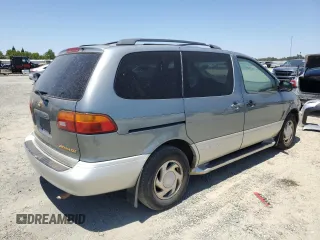 1998 Toyota Sienna LE with VIN 4T3ZF13C4WU064791, listed as a Copart auction lot 61411865 with 218,835 mi miles and Salvage title. Bid and sale history available at DreamBid. Image 3.